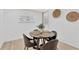 Cozy dining area with seating for four and natural light at 4035 Fairfield S Ave, St Petersburg, FL 33711