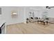 Bright living room with natural light, neutral tones and light wood flooring at 4035 Fairfield S Ave, St Petersburg, FL 33711
