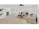 Bright living room with natural light, neutral tones and light wood flooring at 4035 Fairfield S Ave, St Petersburg, FL 33711