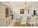 Dining room with a built-in cabinet and chandelier, ideal for hosting gatherings at 4407 Caliquen Dr, Brooksville, FL 34604