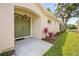 Inviting entryway with double doors and colorful landscaping at 4407 Caliquen Dr, Brooksville, FL 34604