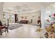 Bright living room featuring high ceilings, tile floors, and elegant decor at 4407 Caliquen Dr, Brooksville, FL 34604