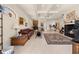 Expansive living room boasting tile floors, a fireplace, and abundant natural light at 4407 Caliquen Dr, Brooksville, FL 34604