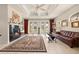 Spacious living area features a fireplace, tiled floors, and glass doors to the outside at 4407 Caliquen Dr, Brooksville, FL 34604