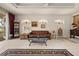 Open living area featuring tile floors, lots of light and a comfortable seating area at 4407 Caliquen Dr, Brooksville, FL 34604