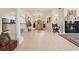 Spacious living room with tile flooring, fireplace, and a neutral color scheme at 4407 Caliquen Dr, Brooksville, FL 34604