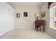 Office area features a desk and chair, with natural light coming in through a window at 4407 Caliquen Dr, Brooksville, FL 34604
