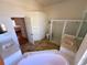Bathroom featuring dual sinks, a bathtub, and a separate shower at 4450 Anaconda Dr, New Port Richey, FL 34655
