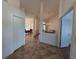 Inviting foyer with tile flooring leads to the dining and living areas, creating an open and airy atmosphere at 4450 Anaconda Dr, New Port Richey, FL 34655
