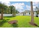 Spacious backyard with a privacy fence, and new grass at 461 Pent St, Tarpon Springs, FL 34689