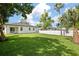 Spacious backyard with a privacy fence, and new grass at 461 Pent St, Tarpon Springs, FL 34689