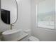 Modern bathroom with vessel sink and white countertops at 461 Pent St, Tarpon Springs, FL 34689