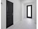 Bright hallway featuring sleek flooring, modern doors, and minimalist design at 461 Pent St, Tarpon Springs, FL 34689