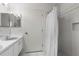 Bathroom featuring a tub and shower and a vanity with double sinks at 473 Tournament Dr, Spring Hill, FL 34608