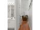 Bright hallway leading to the bathroom and living area at 473 Tournament Dr, Spring Hill, FL 34608