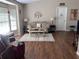 Cozy living room with hardwood floors, neutral paint, and great natural light at 5045 Musselshell Dr, New Port Richey, FL 34655