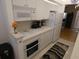 Well-lit kitchen featuring modern appliances and ample counter space at 545 Walden Ct, Dunedin, FL 34698