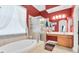 Luxurious bathroom features a soaking tub, glass shower, and double vanity at 6109 Japonica Ct, New Port Richey, FL 34655