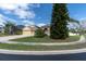 Beautiful home with a three-car garage and a brick paver driveway at 6109 Japonica Ct, New Port Richey, FL 34655