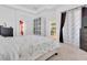 Spacious main bedroom boasts walk-in closets and seamless entry to the en-suite bath at 6109 Japonica Ct, New Port Richey, FL 34655