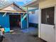 The garage and mobile home share the same color blue at 6507 Ginny Dr, Port Richey, FL 34668
