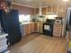 Well-equipped kitchen featuring modern appliances, ample counter space, and stylish cabinetry at 6507 Ginny Dr, Port Richey, FL 34668