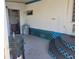 Patio with an older water heater at 6507 Ginny Dr, Port Richey, FL 34668