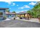 Backyard featuring a covered gazebo with outdoor seating, and blue exterior at 8516 Wooddrift Dr, Tampa, FL 33615