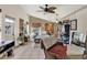 Open bedroom layout featuring tile floors, natural light, and walk-in closet at 8516 Wooddrift Dr, Tampa, FL 33615