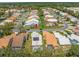 An aerial view showcases the house in a well-maintained neighborhood at 9398 Mississippi Run, Weeki Wachee, FL 34613