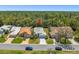 An aerial view highlights the proximity to the wooded area at 9398 Mississippi Run, Weeki Wachee, FL 34613