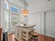 Kitchen island with seating and storage, bathed in natural light from windows at 9398 Mississippi Run, Weeki Wachee, FL 34613