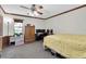 Nicely-decorated bedroom with a ceiling fan and plenty of room at 10134 Buck Dr, New Port Richey, FL 34654