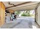 Open garage with an electric door and plenty of room for storage at 10134 Buck Dr, New Port Richey, FL 34654