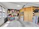 This garage has an electric door and shelving for storage at 10134 Buck Dr, New Port Richey, FL 34654