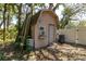 View of backyard storage shed at 10134 Buck Dr, New Port Richey, FL 34654