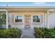 Well-kept home exterior featuring a front porch with decorative flower boxes at 10780 43Rd N St # 702, Clearwater, FL 33762