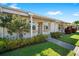 Charming home featuring a well-manicured lawn and lovely landscaping at 10780 43Rd N St # 702, Clearwater, FL 33762