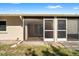 Enclosed patio with screen doors looking out to the backyard at 10780 43Rd N St # 702, Clearwater, FL 33762