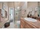 Bathroom with glass shower, tile flooring, granite countertops and a modern sink at 10808 Alico Pass, New Port Richey, FL 34655