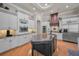 Gourmet kitchen featuring custom cabinets, stainless steel appliances, and a large center island at 10808 Alico Pass, New Port Richey, FL 34655