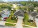 Beautiful aerial view of a well-manicured home featuring a lush green lawn and mature landscaping at 11254 Mollymawk Ct, New Port Richey, FL 34654