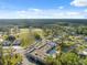 Spacious community with a golf course, pool, and well-maintained greenery with a clear blue sky overhead at 11254 Mollymawk Ct, New Port Richey, FL 34654