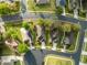 Overhead view of a residential neighborhood with tree-lined streets and well-maintained lawns at 11254 Mollymawk Ct, New Port Richey, FL 34654