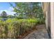 Back patio is lined with pavers and has a view of the backyard at 11254 Mollymawk Ct, New Port Richey, FL 34654