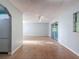 Spacious living room with tile floors, ceiling fan, and sliding doors to the outdoor space at 11648 Boynton Ln # 39Gb, New Port Richey, FL 34654