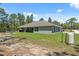 The house has a huge green backyard at 11730 Hawks Nest Trl, Brooksville, FL 34614