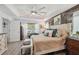 Spacious main bedroom with tray ceilings and generous natural light at 11730 Hawks Nest Trl, Brooksville, FL 34614