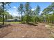 Spacious lot with mature trees surrounding a well-maintained single Gathering home at 11730 Hawks Nest Trl, Brooksville, FL 34614