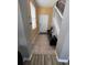 Welcoming foyer with tile flooring, front door, and staircase to the second floor at 11796 Crestridge Loop, New Port Richey, FL 34655